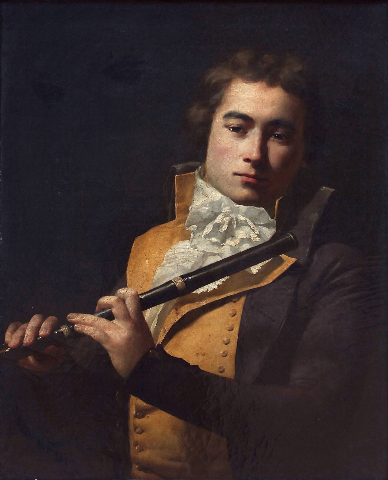 Ritratto dipinto del flautista François Devienne mentre suona un flauto di legno